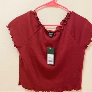 Off the shoulder red crop top.